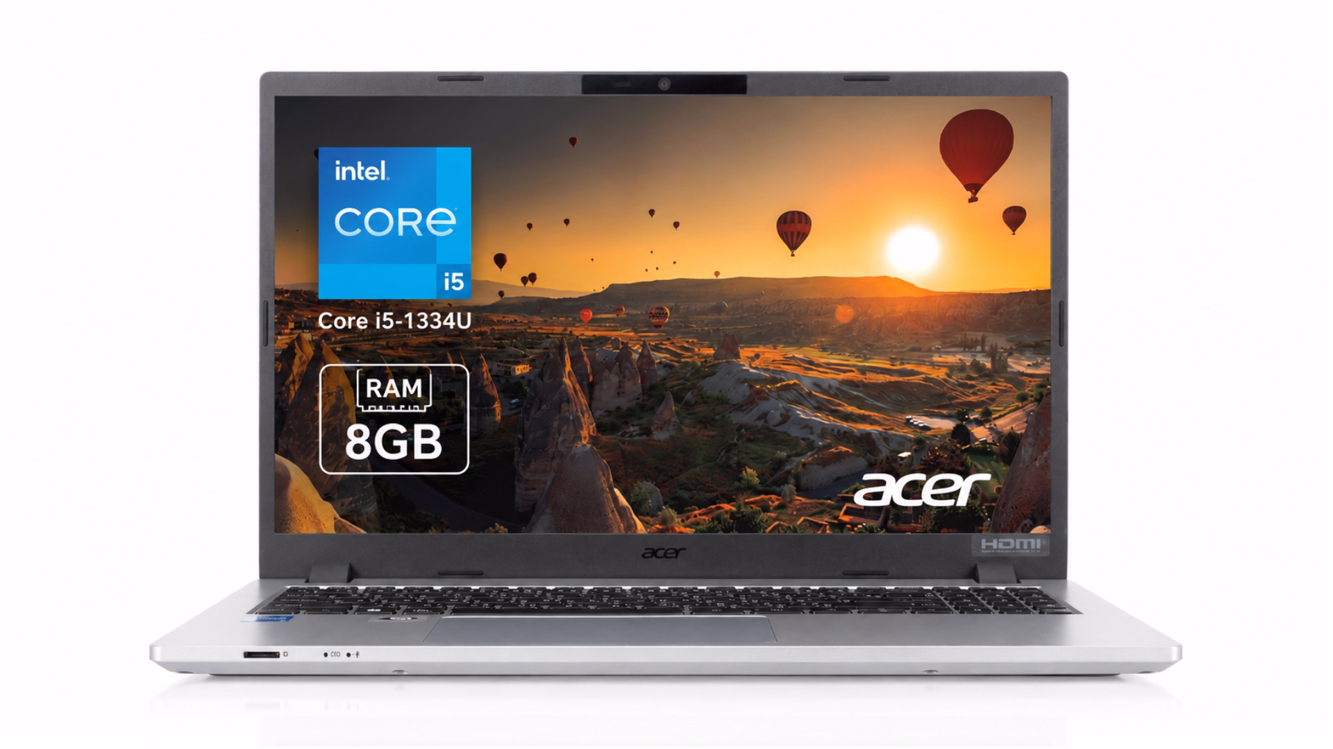 โน้ตบุ๊ก Acer TMP215-55 Intel Core i5-1334U แรม 8GB ตัวเครื่องสีเงิน เปิดหน้าจอแสดงภาพบอลลูนยามพระอาทิตย์ตก พร้อมข้อความ Intel Core i5-1334U และ RAM 8GB บนหน้าจอ วางบนพื้นหลังสีขาว
