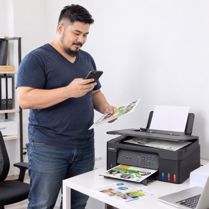 canon-pixma-g3730-aio-ink-tank-printer-3 บรรยากาศการใช้งานเครื่องพิมพ์แท็งก์ไร้สาย Canon PIXMA G3730 ในสำนักงาน สั่งพิมพ์เอกสารสีและรายงานผ่านสมาร์ตโฟน