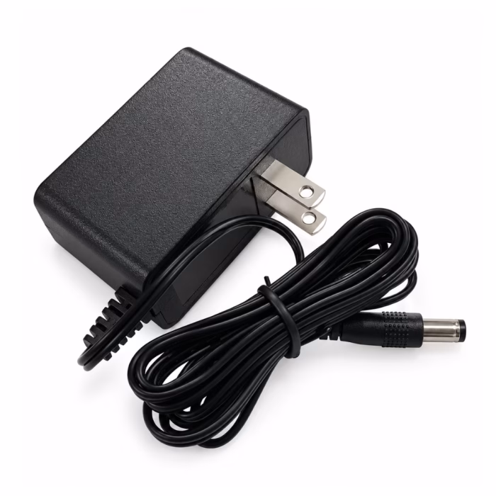 dahua-dh-pfm320-010us-12v-1a-power-adapter-2 อะแดปเตอร์กล้องวงจรปิด Dahua 12V 1A รุ่น DH-PFM320-010US มุมมองสามมิติเฉียง บอดี้สีดำพร้อมสายไฟและหัวแจ็ค DC